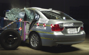 Side barrier crash test of a 2009 BMW 3 Series 4-DR. w/SAB